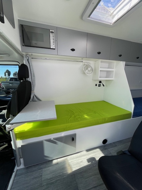 Pop-top campervan in the Focus RV Campbellfield workshop