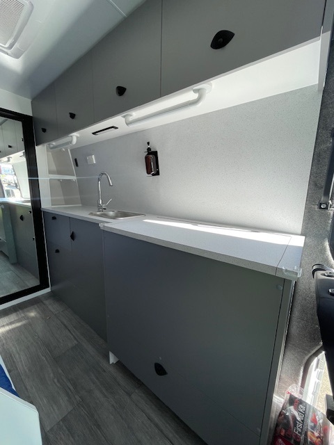 Renault Master campervan kitchen and dinette fit-out by Focus RV